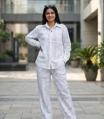 woman wearing white geometric patterned co ord set (6)