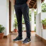 Ferrari black slip on sneaker featuring a yellow shield logo and thick white sole (3)