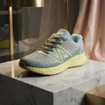 Grey and neon yellow mens running shoes with a chunky sole and N logo (1)