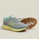 Grey and neon yellow mens running shoes with a chunky sole and N logo (4)