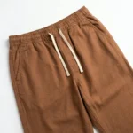Men wearing brown relaxed fit casual drawstring trousers (3)