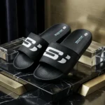 Mens black Hyper Burst recovery slider shoes with bold white logo (1)