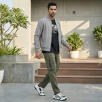 Men's olive green cargo jogger pants with elastic drawstring waist and utility pockets (1)