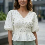 Off white floral print v neck peplum top with puffed sleeves for women (1)