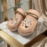 Womens beige platform clogs with rhinestone and pearl charms (4)