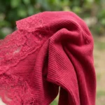 Women's maroon ribbed knit party wear top with front embellishments and lace v neck (4)