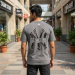 grey oversized round neck t shirt with subtle chest logo and large NY back graphic (1)