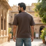 man wearing a brown oversized graphic printed t shirt (2)