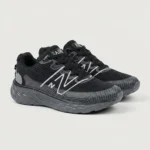 mens black mesh running shoe with thick grey textured sole and white side logo (1)