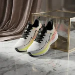 white mesh running shoes with black laces (1)