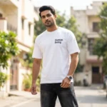 white t shirt with a large black shipping label graphic and Human Being text (1)