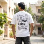 white t shirt with a large black shipping label graphic and Human Being text (2)
