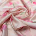 woman wearing a pink floral satin co ord set (2)