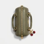 Coach olive green embossed leather mini satchel bag for women with cherry charm (2)