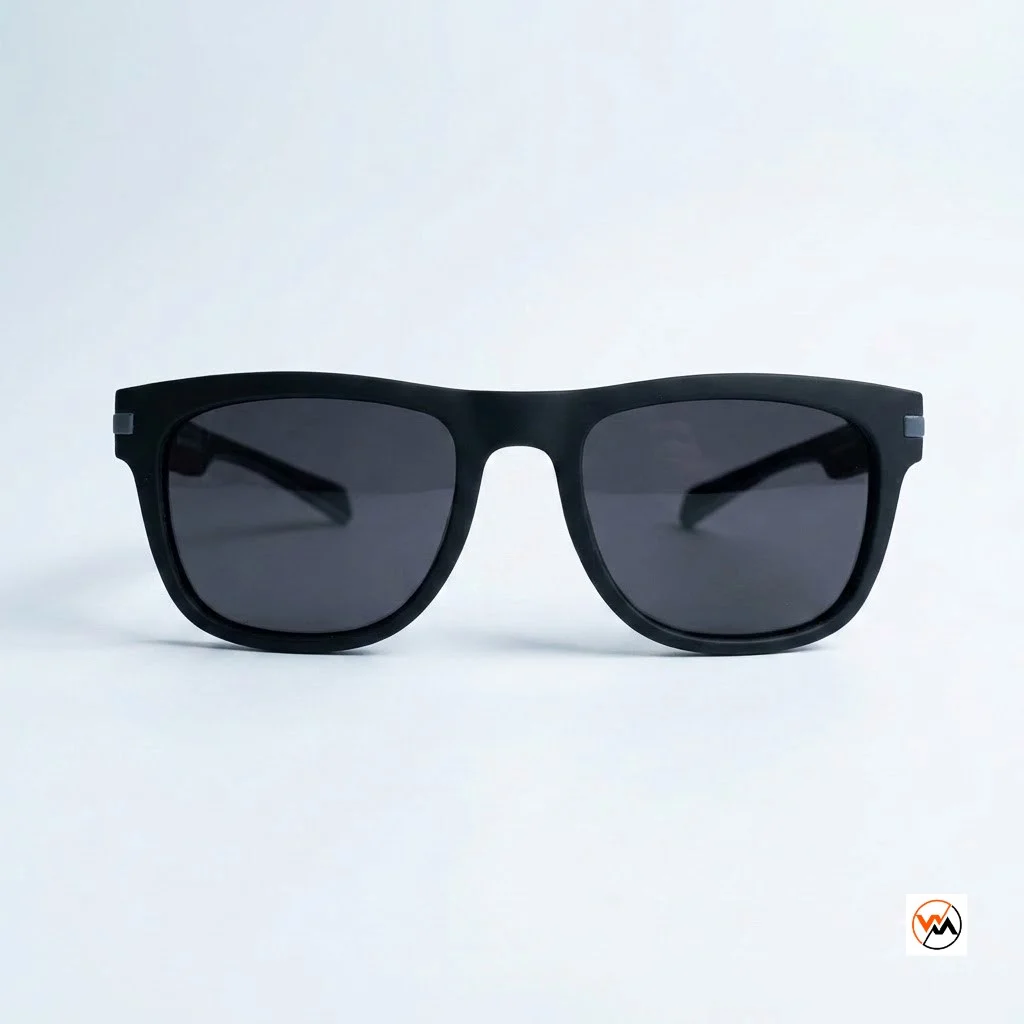 Black sunglasses make an essential accessory for men seeking refined style. – Black sunglasses – photo 1