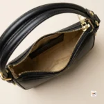 Coach shoulder bag is an iconic brown accessory featuring dark trim and gold hardware – coach shoulder bag – photo 4