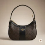 Coach shoulder bag is an iconic brown accessory featuring dark trim and gold hardware – coach shoulder bag – photo 5