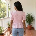 light pink smocked peplum top with puff sleeves (4)