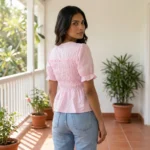 light pink smocked peplum top with puff sleeves (5)