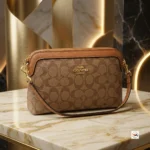 Signature shoulder bag brings iconic design and refined style to your daily wardrobe. – Signature shoulder bag – photo 1