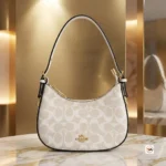 Signature Shoulder Bag Featuring Iconic Coach Monogram Design – shoulder bag – photo 1