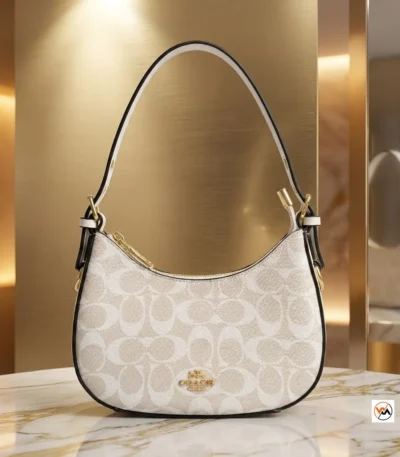 Signature Shoulder Bag Featuring Iconic Coach Monogram Design – shoulder bag – photo 1