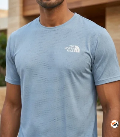 Mens blue t shirt by The North Face featuring essential perforated styling – blue t shirt – photo 1
