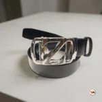 Mens black leather belt with metal buckle, an exclusive accessory for formal wear – mens black leather belt – photo 1
